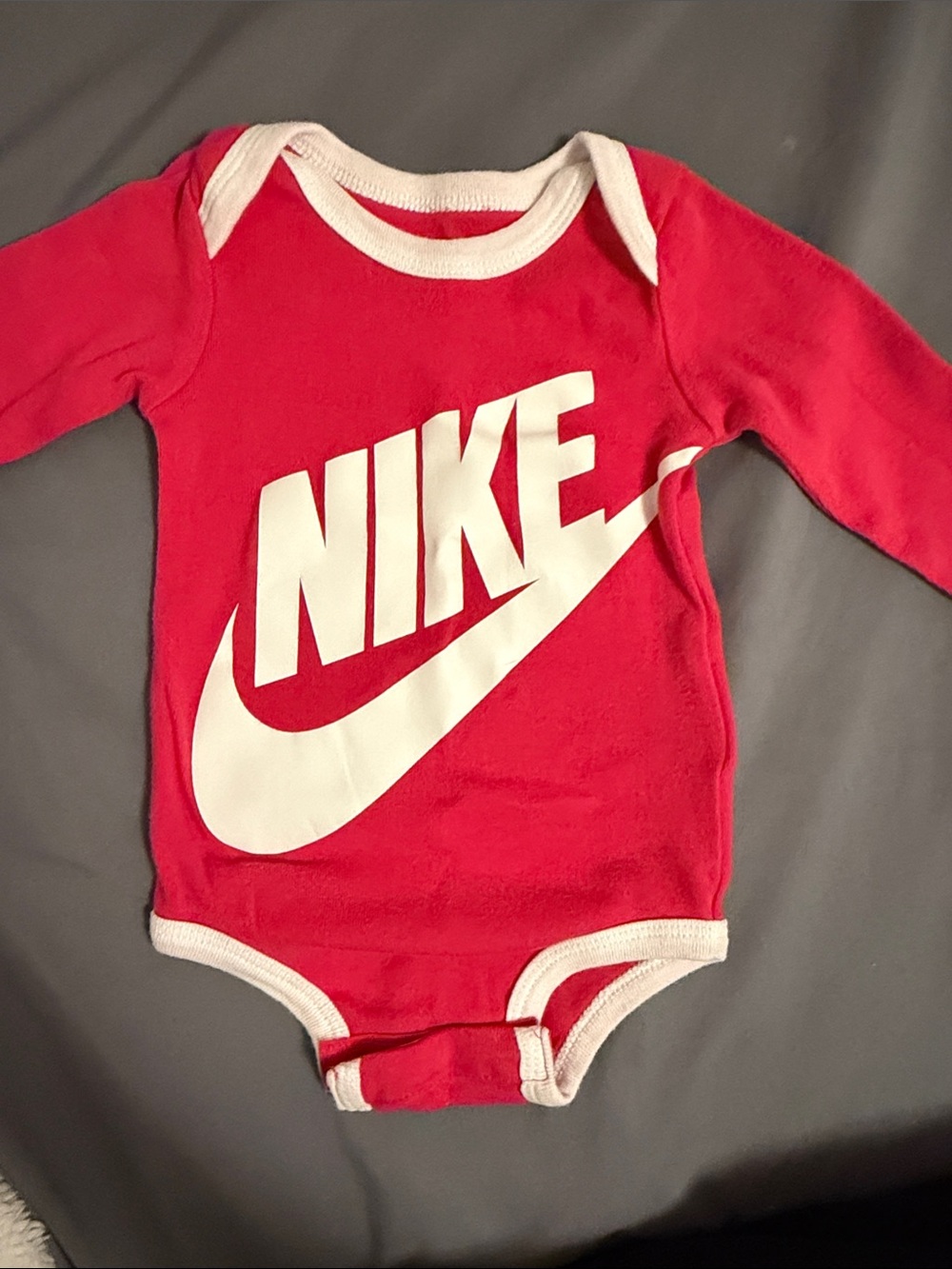 Nike Pink Infant Bodysuit with White Swoosh